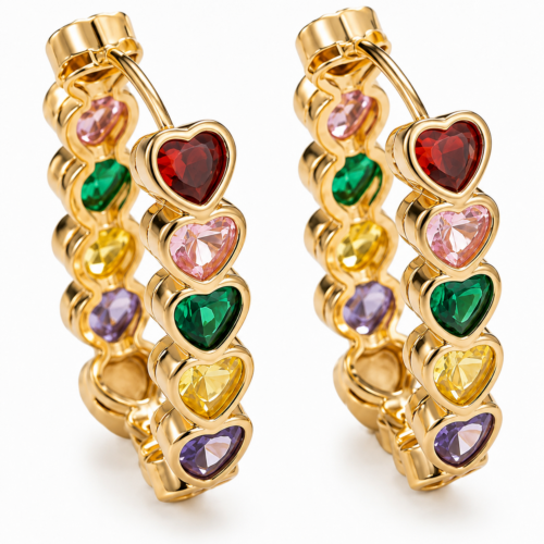 Crystal heart hoop earrings with faceted stones in polished gold-tone settings