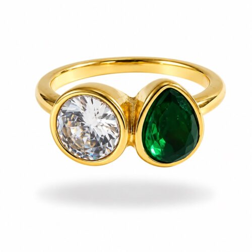 Crystal ring with green teardrop stone and clear round crystal in gold-tone setting